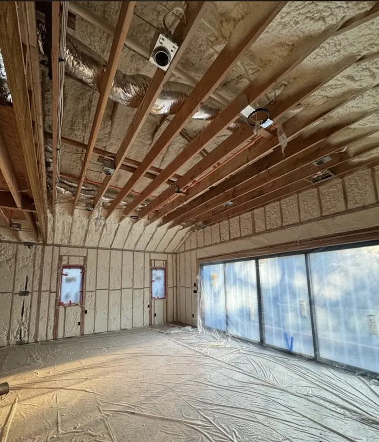 Interior walls and ceiling insulated with spray foam during new construction in Weslaco